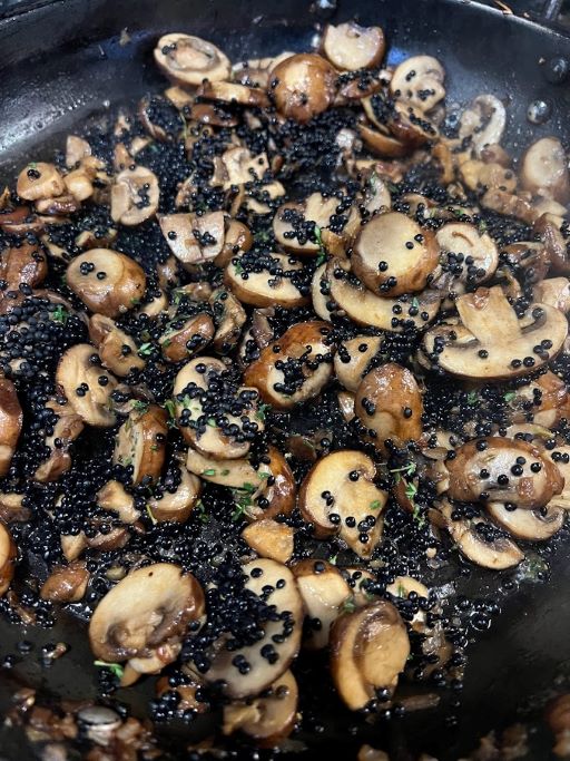 lentils and mushrooms in a pan 