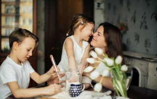 mom and children at table