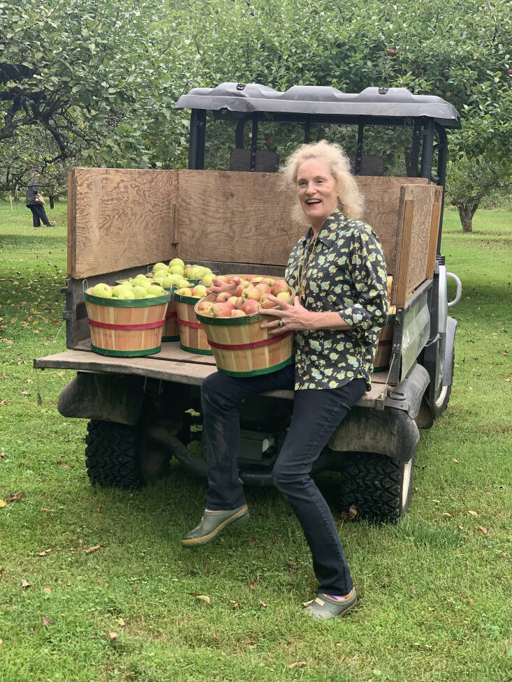 women farmer with apples
