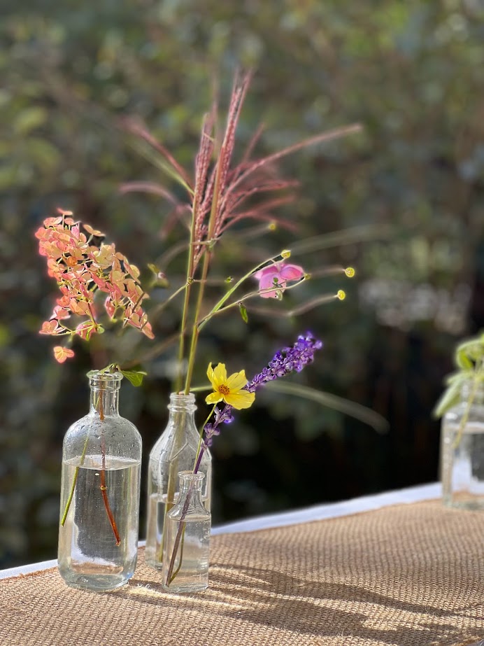 flowers in water in vase