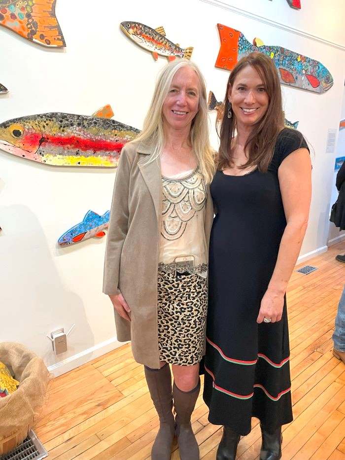 artist and chef at gallery opening