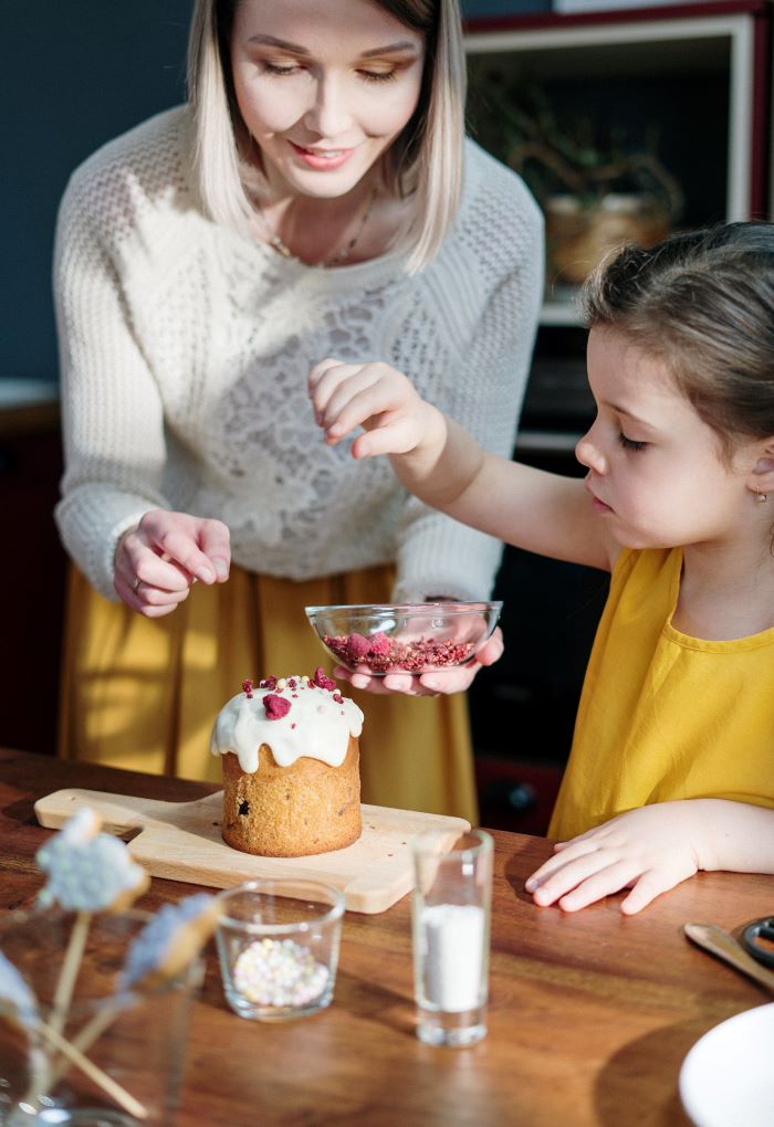 women and child baking