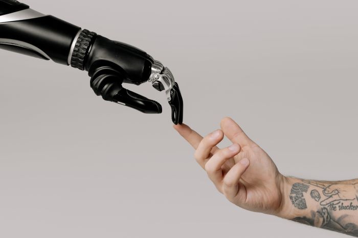 robot and human touching 