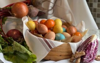 Colored eggs in basket